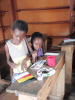 These students in Tutu, Ghana create extra art pieces for their 